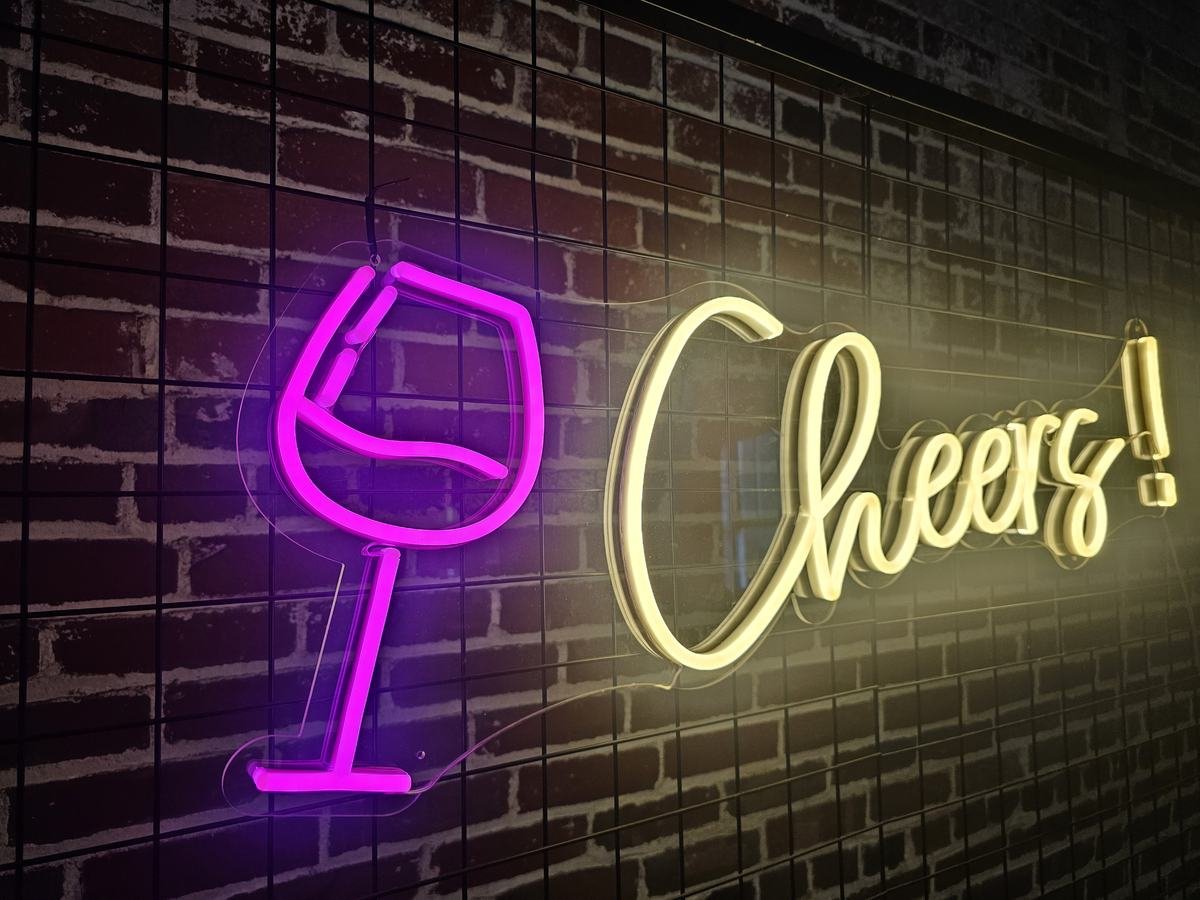 Cheers neon sign with wine glass icon