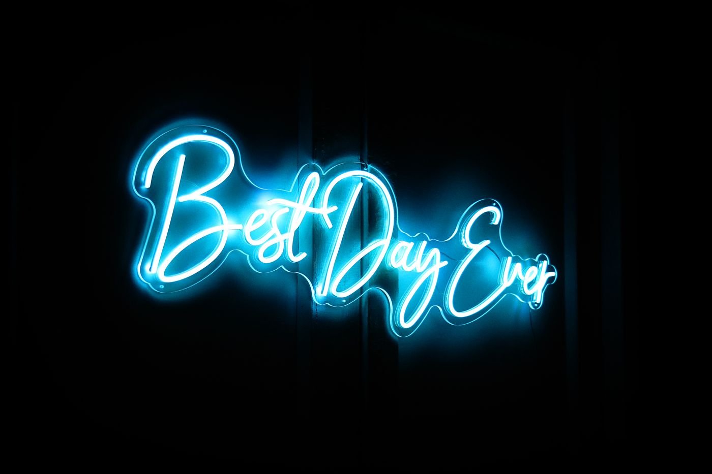 Best Day Ever script neon sign glowing cyan